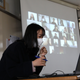 A teacher wears a mask as she gives a lesson on the first day of online class in an empty classroom as South Koreans take measures to protect themselves against the spread of coronavirus (COVID-19) at Seoul Girls High School on April 09, 2020 in Seoul, South Korea.